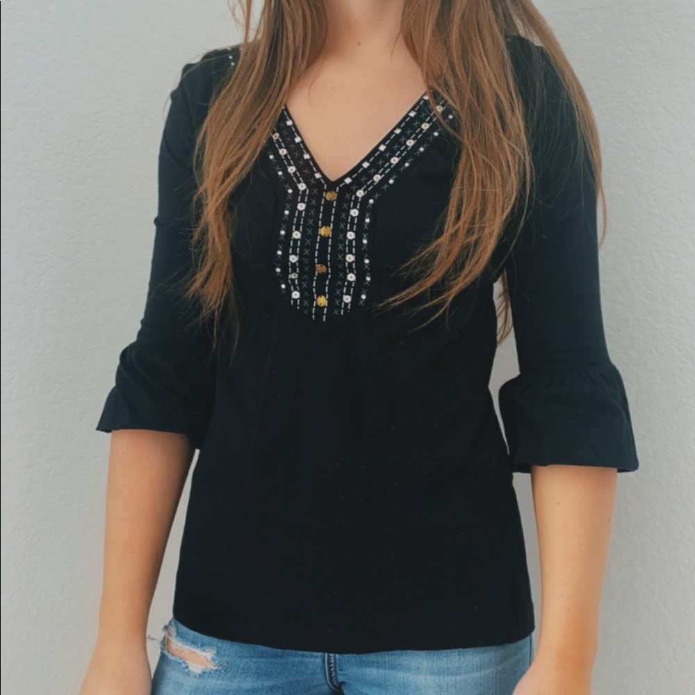 black v-neck with beading